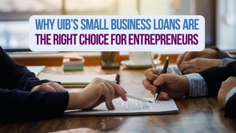 A person signing paperwork