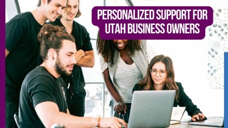 Five people looking at a computer screen