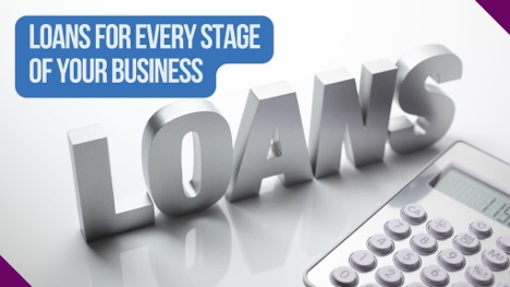 Loans next to a calculator